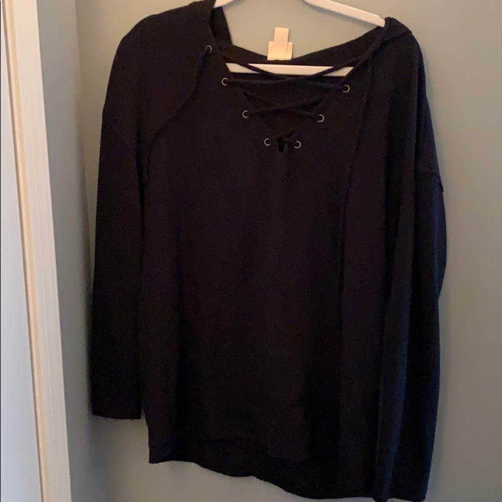 black long sleeve with cris cross design on front